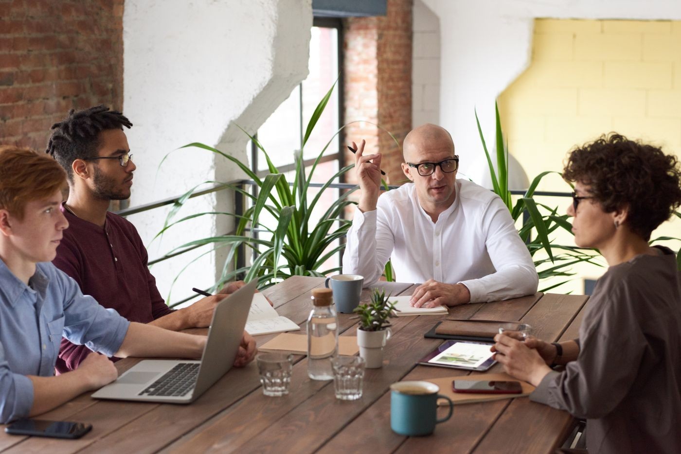 A team discussing ideas around a table